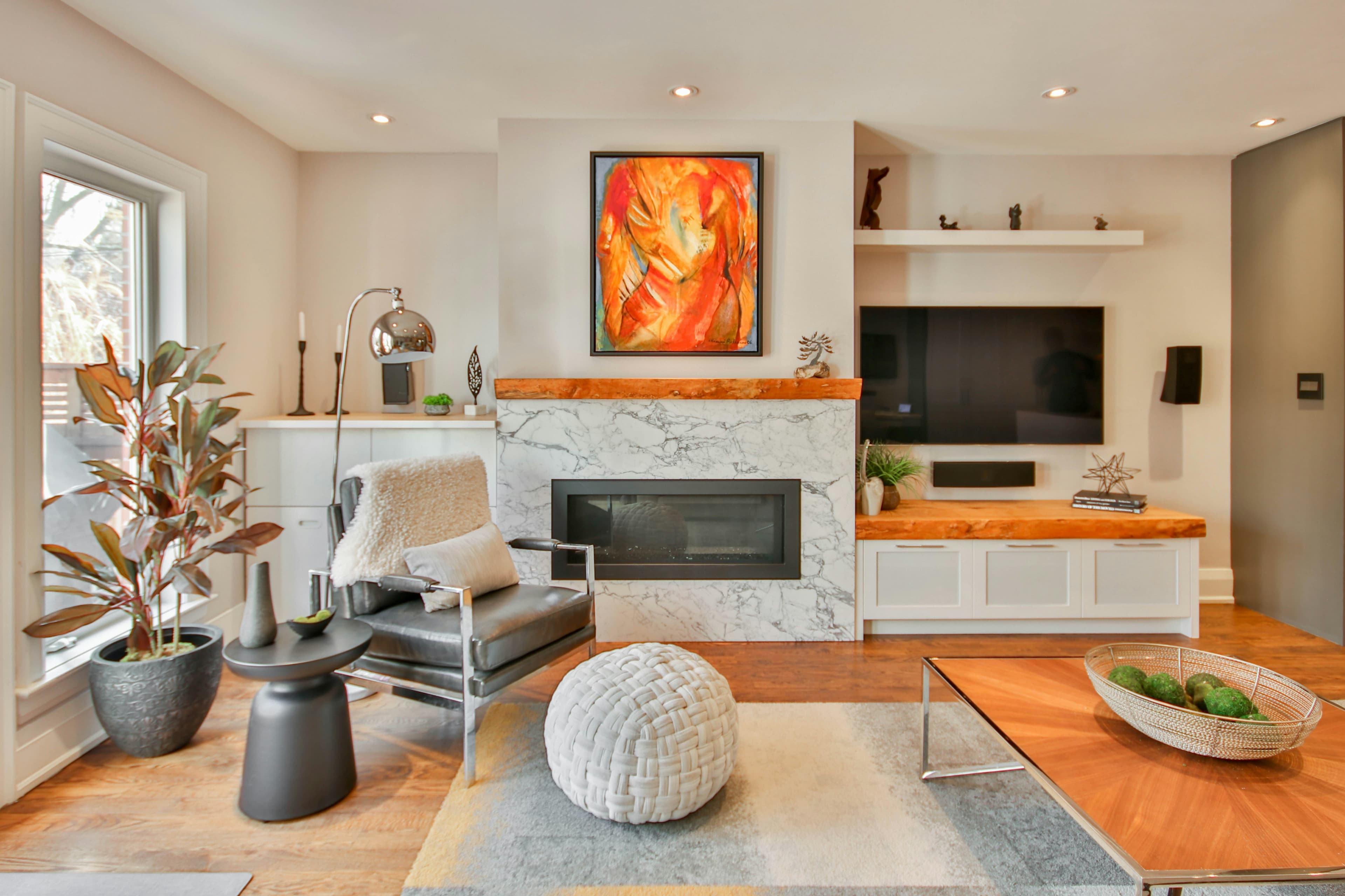 Modern living room with marble fireplace